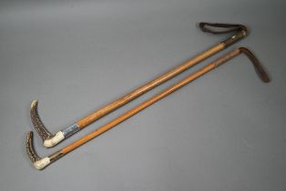 Two malacca riding crops with antler handles, one with 9ct gold band, Julius Klinkhardt, London