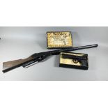 A vintage boxed Webley Scott 'Junior' air pistol to/w a 'Daisy' pop-gun (2) Purchasers must be 18