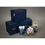 Three boxed small Moorcroft vases, 'Alpine Meadow' 10 cm; 'Wild Cornflowers' 10 cm; and 'Muscari' 10