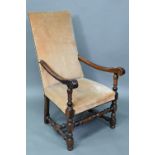 An 18th century walnut open framed and upholstered high back armchair, on a part turned H
