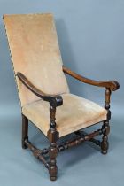 An 18th century walnut open framed and upholstered high back armchair, on a part turned H