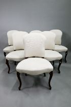 A set of six traditional French walnut framed upholstered dining side chairs, with linen covers