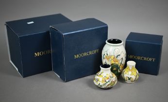 Three boxed small Moorcroft vases with floral designs - 10.5/6/5.5 cm (3)