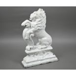 A cast iron Victorian door stop modelled as a lion rampant, painted white, 37 cm