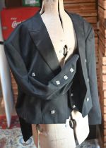 A black wool jacket and matching waistcoat, with square white metal buttons, size 54L