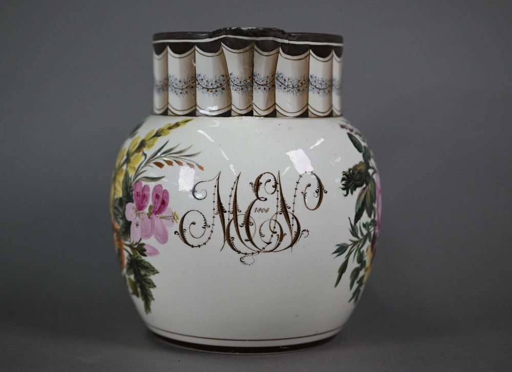 A Regency creamware jug with trompe l'oeuil pleated neck above 'MEN' monogram dated 1808, flanked by - Image 2 of 5