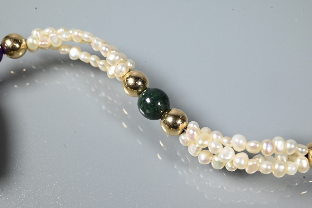 A pearl necklace comprising a triple row of river pearls with hardstone beads and heart to centre, - Image 4 of 5