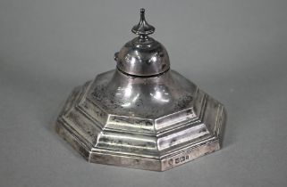 An Edwardian loaded silver hexagonal inkwell in the Georgian taste, with domed cover and stepped