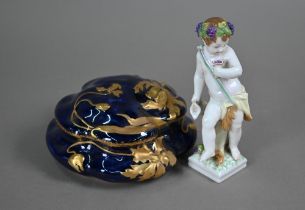 A Berlin KPM porcelain figure of a Bacchanalian putto, 16 cm high, to/w a Limoges Rose et Guillard