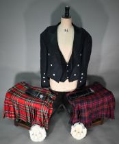 A pair of grey tartan trousers by the Kilt Society, 46R; two tartan kilts, size 46/48 amd 48 and c/w