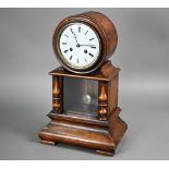 A Victorian mahogany drum cased mantel clock, the eight day two train movement striking on a bell,