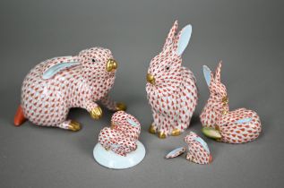 Two Herend (Hungary) red scale rabbits, 11 x 13 cm /14 cm high to/w two small groups of two