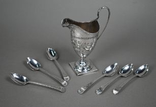 A George III silver cream jug in the Adam taste, with engraved decoration, on stemmed square foot,