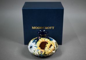 A boxed Moorcroft 'Sandbach Bouquet' squat vase by Vicky Lovatt, 10 cm high x 13 cm diam