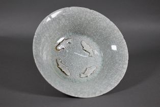 A Chinese lonquan Celadon floriform bowl with four relief moulded fish and pale green crackled