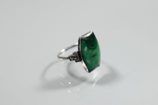 An Art Deco style silver, malachite and cubic zirconia set cocktail ring, size P