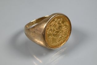 AMENDMENT HALF SOVEREIGN A George V gold sovereign dated 1915 in unmarked yellow metal ring mount