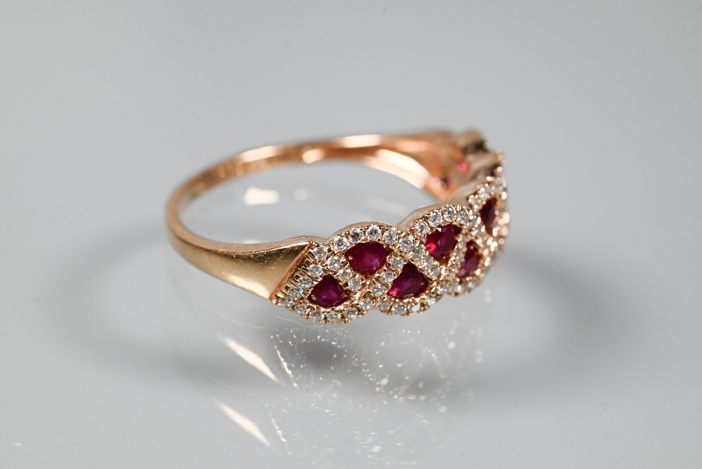 A ring and earring suite stamped 'Royal', with ruby and diamond lattice-work design, rose metal - Image 3 of 6