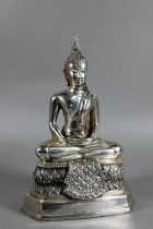 A 20th century silvered base-metal Thai figure of Shakyamuni Buddha with hands in the meditation