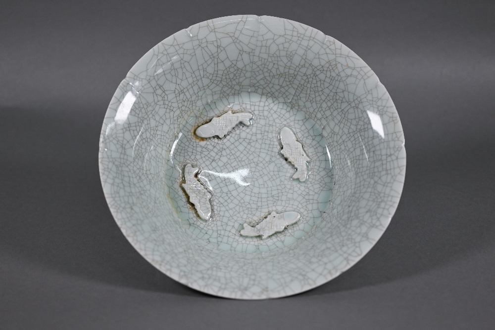 A Chinese lonquan Celadon floriform bowl with four relief moulded fish and pale green crackled - Image 3 of 8