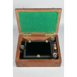 A lacquered brass Artificial Horizon maritime navigational instrument 25 x 10.5 cm overall, in