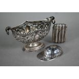 A Victorian silver stemmed oval salt, richly embossed and chased with scrolling foliage, Chester