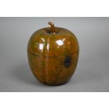 A turned and carved wood tea caddy in the form of a melon, 12.5 cm high