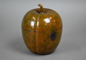 A turned and carved wood tea caddy in the form of a melon, 12.5 cm high