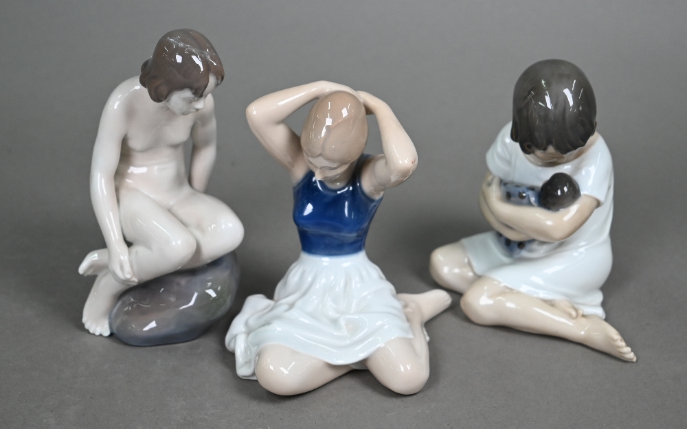 Three Royal Copenhagen seated figures - 1938 Girl with Doll, 4027 Girl on Rock and 4648 dancer - Image 2 of 4