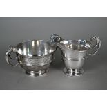 A late Victorian silver milk jug and sugar basin with scroll handles, Goldsmiths and Silversmiths