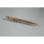 A 9ct yellow gold cased propelling 'Yard-O-led' pencil, engine turned decoration