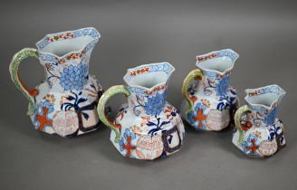 An early 19th century graduated set of four Davenport stone china jugs, 18-11cm