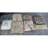 A stack of seven assorted antique tapestry cushions (7)