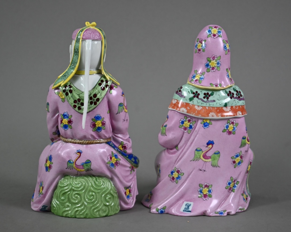 A pair of Dresden figures of a Chinese couple in pink official's robes painted with flowers and - Image 6 of 9