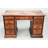 A Victorian Aesthetic period ebonised and walnut pedestal desk, the tooled leather inset top with