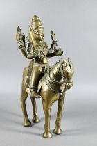 An Indian brass figure of Khandoba (manifestation of Shiva) on the back of his horse, the four-armed