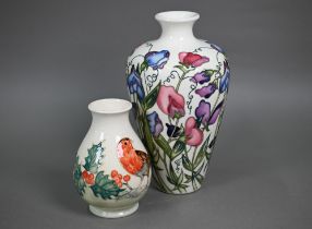 A Moorcroft 'Sweetness' cream-ground vase, 24 cm to/w a smaller vase decorated with a Robin and