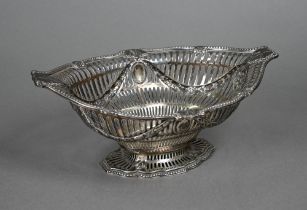 A late Victorian pierced silver bonbon dish in the Sheraton manner, on stemmed foot, F.B. Thomas &