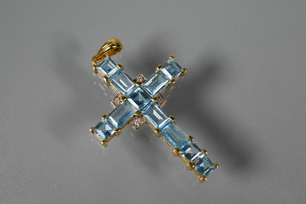 A cross-shaped pendant set overall with square and rectangular cut blue topaz, diamond set centre, - Image 2 of 6