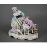 A 19th century porcelain group, 18th century mother and child, the boy feeding scraps to a