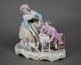 A 19th century porcelain group, 18th century mother and child, the boy feeding scraps to a