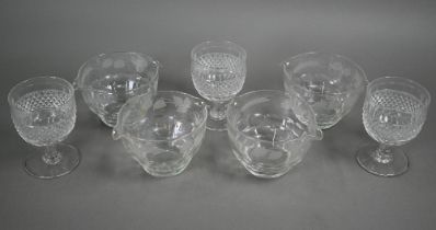 A set of four 19th century cut glass ice cooling bowls with double lips and etched hops and barley