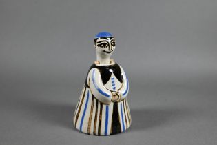 A 1950s Mevagissey Pottery slip moulded nodding figure by Bernard Moss, with typical blue and