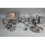 A quantity of electroplated wares including biscuit-box, cocktail shaker, salver, coffee pot,