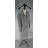 A Chanel Boutique coat dress in black and white houndstooth check wool, with high collar and small