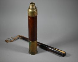 A Victorian brass and mahogany two-draw telescope, 88 cm overall to/w a rosewood belaying-pin with