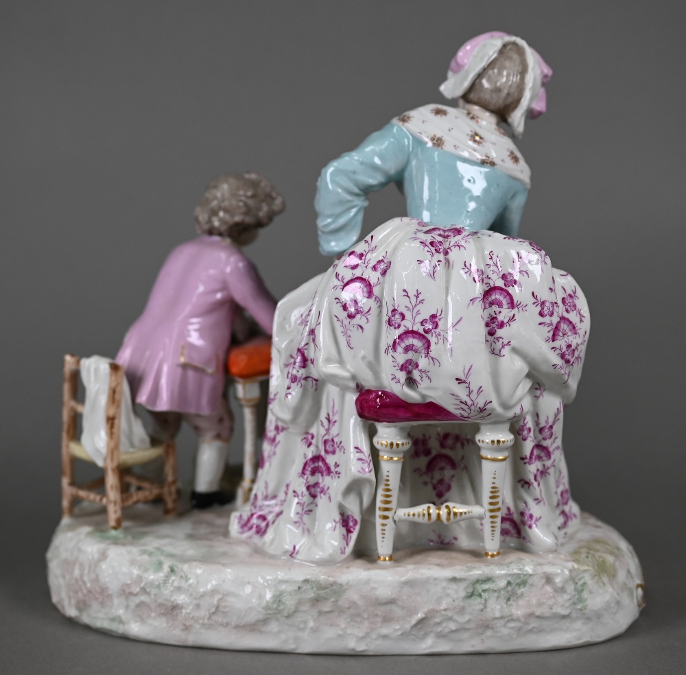 A 19th century porcelain group, 18th century mother and child, the boy feeding scraps to a - Image 4 of 6