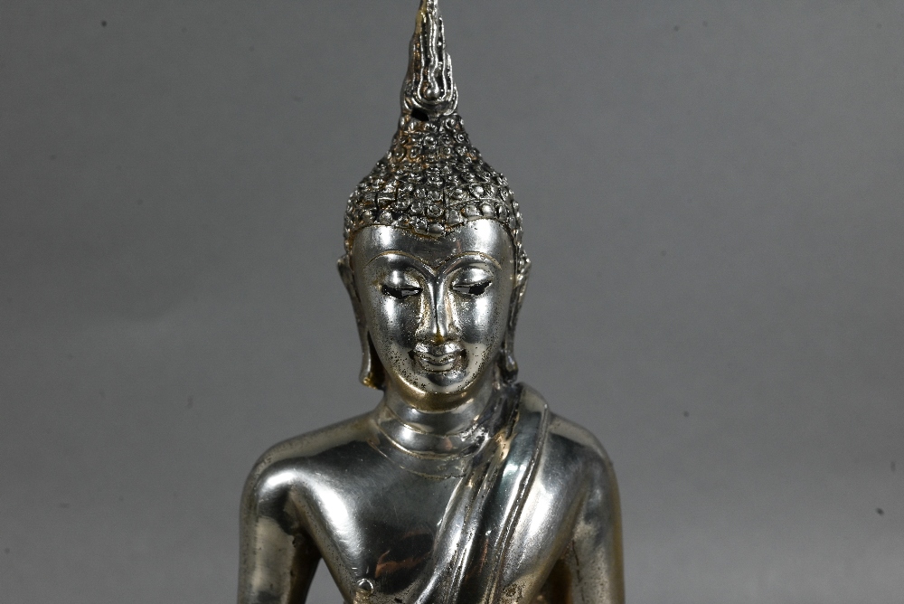 A 20th century silvered base-metal Thai figure of Shakyamuni Buddha with hands in the meditation - Image 3 of 6