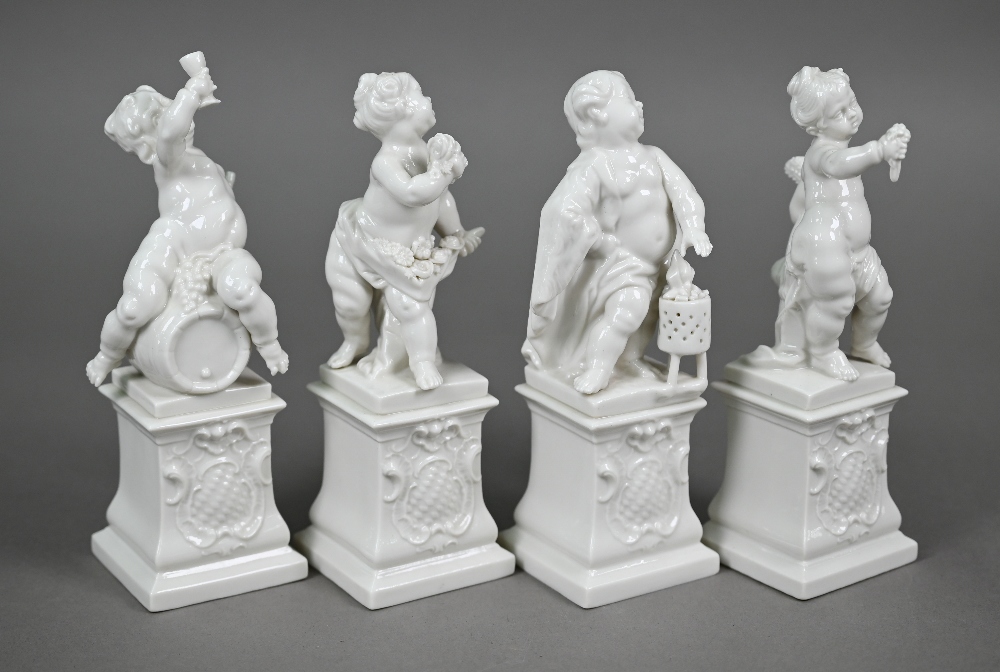 A set of four Nymphenburg white-glazed putti on plinths - The Four Seasons, 17 cm high (4) - Image 2 of 5