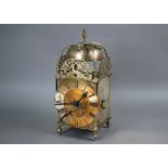 A large brass 17th century style lantern clock, the engraved dial signed Thomas Madge, with two